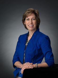 Portrait of Ellen Ochoa wearing a blue suit